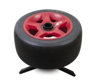 FALCON EB: A DJR tyre coffee table from Dick Johnson's Shell-FAI Racing Team Ford Falcon EB. As used during the 1994 Australian Touring Car Championship. Dunlop tyre signed by Dick Johnson. CoA - 4