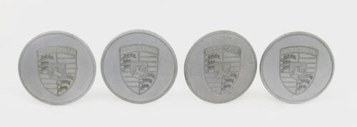 901: A set of Porsche hub cap centres