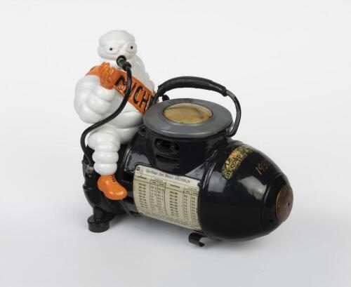 MICHELIN: A small 110 volt Bibendum figured compressor, French circa 1928