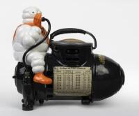 MICHELIN: A small 110 volt Bibendum figured compressor, French circa 1928 - 2