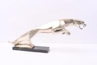 BRYSON'S: A circa 1960s metal showroom figure of a leaping jaguar, mounted on granite base with affixed label &lsquo;Property of Bryson Ind. Ltd&rsquo;, 23cm high, 57cm wide [Location: Melbourne] - 3