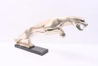 BRYSON'S: A circa 1960s metal showroom figure of a leaping jaguar, mounted on granite base with affixed label &lsquo;Property of Bryson Ind. Ltd&rsquo;, 23cm high, 57cm wide [Location: Melbourne] - 4