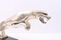 BRYSON'S: A circa 1960s metal showroom figure of a leaping jaguar, mounted on granite base with affixed label &lsquo;Property of Bryson Ind. Ltd&rsquo;, 23cm high, 57cm wide [Location: Melbourne] - 5