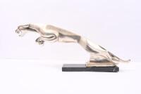 BRYSON'S: A circa 1960s metal showroom figure of a leaping jaguar, mounted on granite base with affixed label &lsquo;Property of Bryson Ind. Ltd&rsquo;, 23cm high, 57cm wide [Location: Melbourne] - 6
