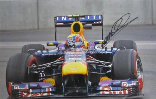WEBBER: Two images of Mark Webber driving Red Bull F1 car - one with CoA. Both images signed by Mark Webber