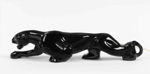 BRYSON'S: A circa 1960s black ceramic lamp in the form of a prowling jaguar, with affixed label to base &lsquo;Property of Bryson Ind. Ltd&rsquo;,&nbsp;10.5cm high, 50cm long [Location: Melbourne]
