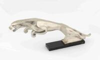 BRYSON'S: A circa 1960s metal showroom figure of a leaping jaguar, mounted on granite base with affixed label &lsquo;Property of Bryson Ind. Ltd&rsquo;, 23cm high, 57cm wide [Location: Melbourne]