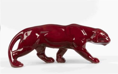BRYSON'S:&nbsp;A circa 1960s oxblood ceramic figure of a prowling jaguar, with affixed label to base &lsquo;Property of Bryson Ind. Ltd&rsquo;,&nbsp;19cm high, 47cm long [Location: Melbourne]