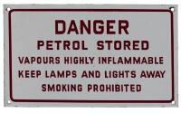DANGER: A 'DANGER Petrol Stored' white enameled tin sign, (19cm high x 32.5cm wide)