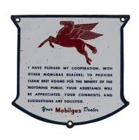 MOBILGAS: A small enameled 'Mobilgas' dealers rest room shield&nbsp;with Pegasus horse, (19.5 cm high x 20.5cm wide)