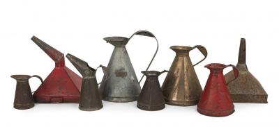 POURERS: Six metal and brass oil pourers, together with two square form petrol funnels