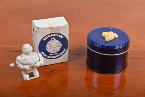 MICHELIN: A modern Michelin clockwork bib with box, and metal tin