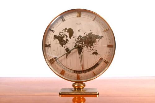 CLOCK: A 1958 mechanical world time zone table clock built by Heinrich Johannes Moller for Kienzle. Face with diameter of 25cm