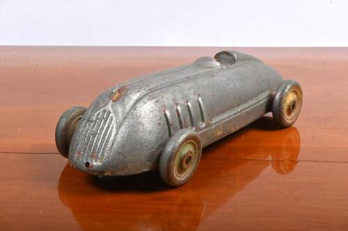 LANDSPEED: A circa 1920s/1930s 'Stokes Toys' aluminum pull land speed record style car, 27cm long