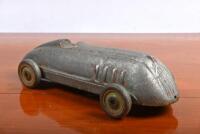 LANDSPEED: A circa 1920s/1930s 'Stokes Toys' aluminum pull land speed record style car, 27cm long - 2