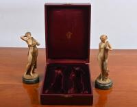 NEO-CLASSICAL FIGURINES: A pair of resin neoclassical naked maiden figures