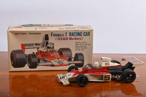 McLAREN: A McLaren M23 Japanese battery powered Formula 1 RACING CAR (TEXACO-Marlboro) by ALPS