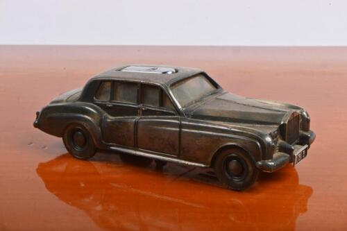ROLLS-ROYCE: A cigarette lighter in the form of a Rolls-Royce