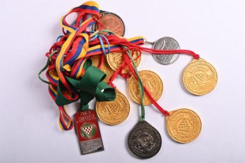 MOTORSPORT RALLIES: A collection of predominantly 1990's TARGA TASMANIA Achievement and Finisher Awards medallions
