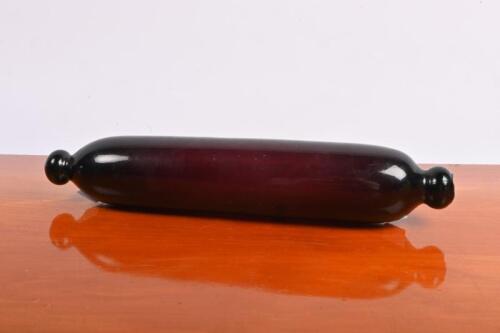ROLLING PIN: A 1920's/1930's glass rolling pin in purple glass