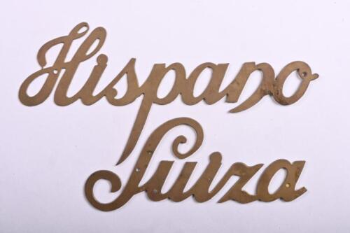 HISPANO SUIZA: A brass 'Hispano Suiza' badge