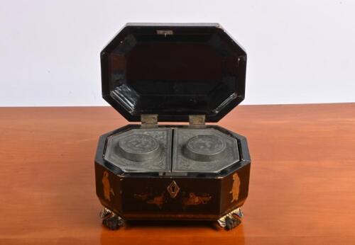 TEA CADDY: An antique oriental octagonal paper mache tea caddy