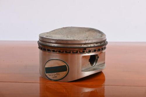 PISTON HEAD: A Cosworth piston head