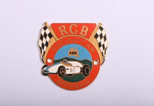 RCB: A brass RACING CAR BROKERS badge
