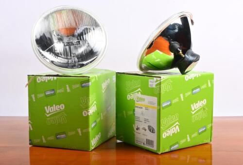 HEAD LAMPS: Two new old stock CIBIE IODE H4 headlamp units