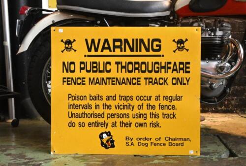 DOG FENCE: A yellow 'WARNING NO PUBLIC THOROUGHFARE FENCE MAINTENANCE TRACK ONLY' sign. Sign measures 78.5cm wide, 67cm high overall