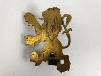 PEUGEOT: A gold Peugeot 504 Lion car grille badge