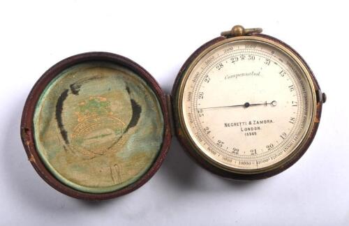 BAROMETER: A Negretti & Zambra, London brass cased compensated pocket barometer. No. 13565