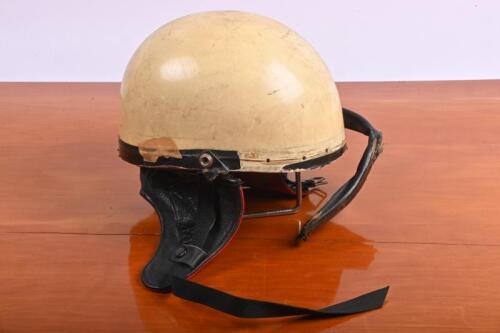 MOTORCYCLE HELMET: A white IRC motorcycle helmet with black leather strap