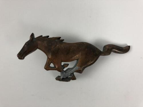 MUSTANG: A metal Ford Mustang car mascot