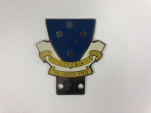 VICTORIA: A 'Victoria The Garden State' metal car badge with Union Jack and banner
