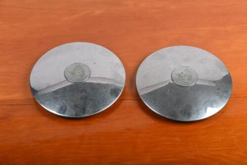 356: Two Porsche 356 hubcaps with emblems
