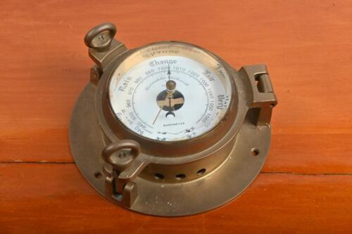 BAROMETER: A Wolstenholme, Charlesworth & London brass nautical barometer