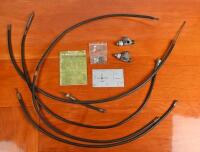 HALDA: A group of HALDA TWINMASTER items. Four drive cables, one extension cable, two T-Gears, two mounting clips, Halda Co-driver's Handbook & gear setting template