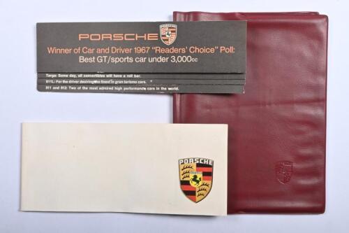 PORSCHE 911: A group of 1960's Porsche 911 related items. Porsche 911 vinyl Manual Pouch & Model Catalogues