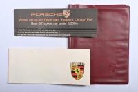 PORSCHE 911: A group of 1960's Porsche 911 related items. Porsche 911 vinyl Manual Pouch & Model Catalogues