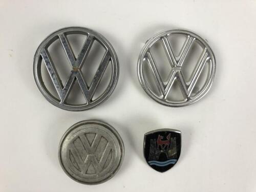 VOLKSWAGEN: Four&nbsp;Volkswagen items including three car&nbsp;badges and cap