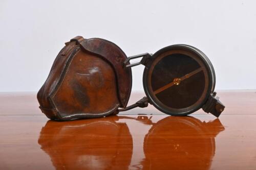 COMPASS: A vintage bronzed prismatic compass with original leather case. Retailed by Littlejohn & Son, Wellington N.Z