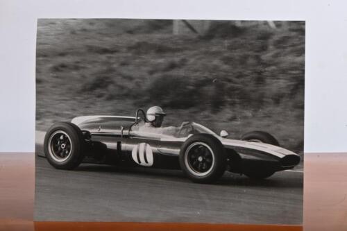 BRABHAM: An original black and white photograph of Sir Jack Brabham competing at the 1961 Dutch Grand Prix