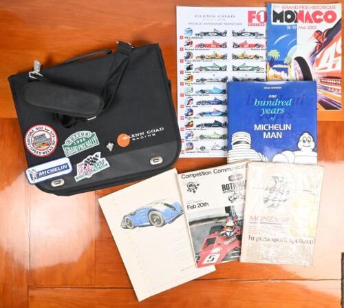 MOTOR RACING/MOTORING: A group of motor racing and motoring items. Vintage Bibendum badge by BADGERS. February 1977 issue of Competition Communicator & Cloth Badges