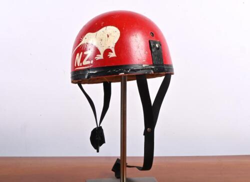 N.Z PLUM PUDDING HELMET: A circa 1950's red GEORGE FISHER of Keswick, Adelaide plum pudding helmet. Size 7