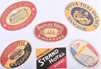 TRAVEL LUGGAGE DECALS: A collection of original, unused 1950's/1960's hotel travel luggage decals. 'GRAND HOTEL D'ANGKOR', 'LE ROYAL HOTEL, CAMBODIA', 'E&O HOTEL PENANG','EUROPE HOTEL SINGAPORE' decals - 2