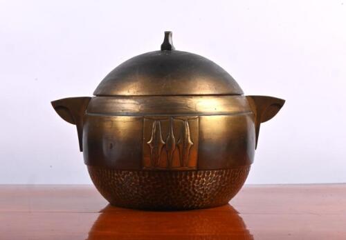 JARDINER: An Art Deco brass jardiner