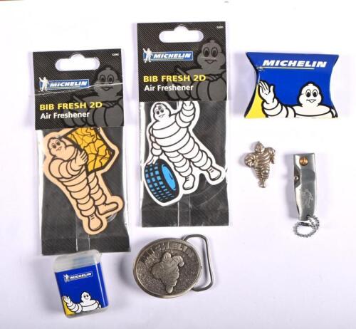 MICHELIN: A group of MICHELIN related items. Ear plugs, belt buckle featuring a running Bibendum, air fresheners