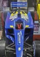 MICHELIN: A rare large model of a Michelin branded F1 car, on presentation base with perspex case and inscription plaque reading 'Formula One World Championship 2003, Australian Grand Prix',car approx. 72cm long, 29cm wide - 4