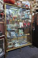 DISPLAY CASE: An early 20th century brass display case. Measures 200cm high, 134.5cm wide, 37.5cm deep